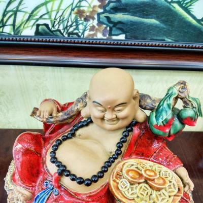 Tượng Phật Di Lặc vác cành đào